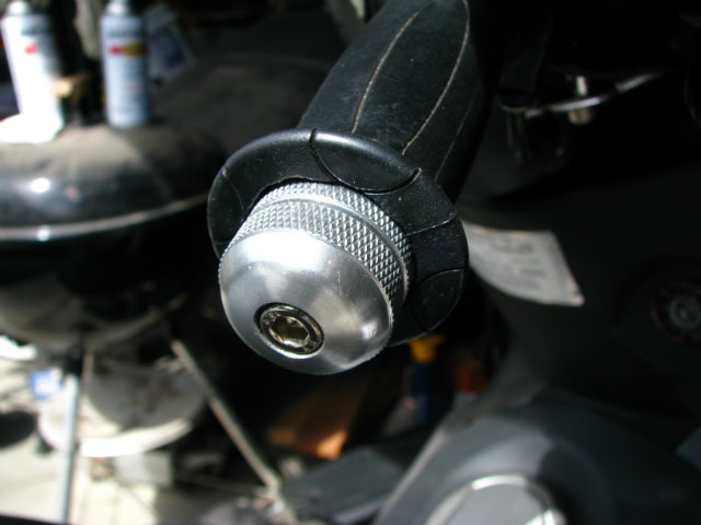 Closeup of throttle side bar end. The bar end is recessed into the grip with enough of the grip trimmed away to allow a smooth throttle return.