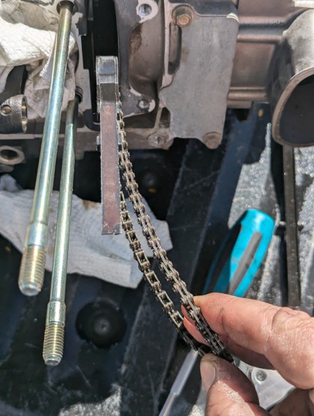 Dunno about the cam chain. Seems a bit stretched.