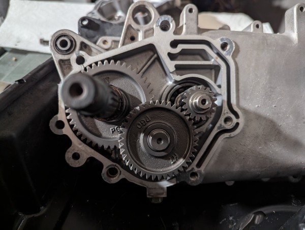 Clean gearbox.Gasket remnants were removed before reassembly.