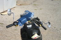 The top piece was turned around facing the seat when I got back to my scoot.