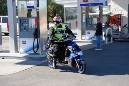 Scootermeister, Kymco S9 70cc Malossi, 3rd Overall/1st Place 125cc Class. Fueling for the third time at Chevron, Furnace Creek, Death Valley, California.