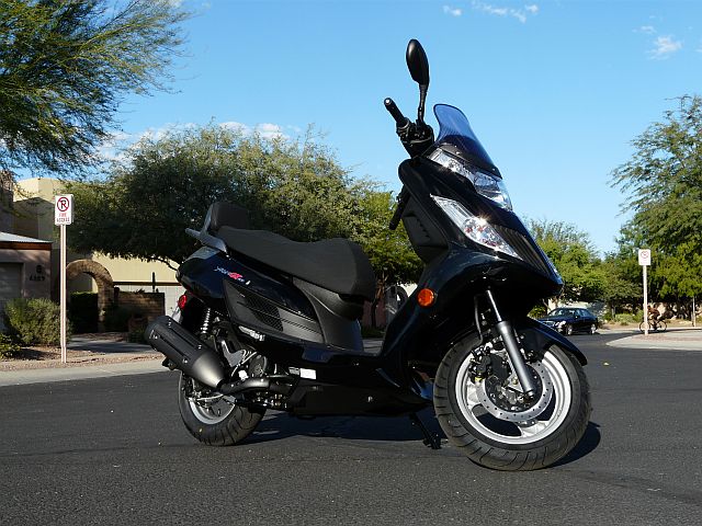 2012 Kymco Yager GT200i, in Blue-Black. I picked it up with ZERO miles!